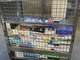 a metal cart with many items on it in a warehouse