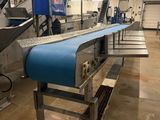 a conveyor belt in the middle of a factory