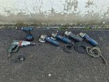 a lot of tools that are laying out on the ground