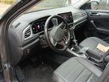 the interior of a car with a steering wheel, dashboard, and dash board