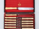 a box with a set of knives and a knife sharper