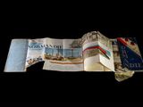 an open book with a picture of a boat on it