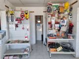 a garage with a lot of tools and tools on the wall