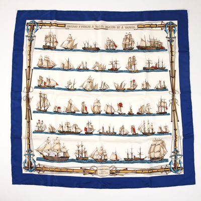 an image of a blue and white scarf with ships on it