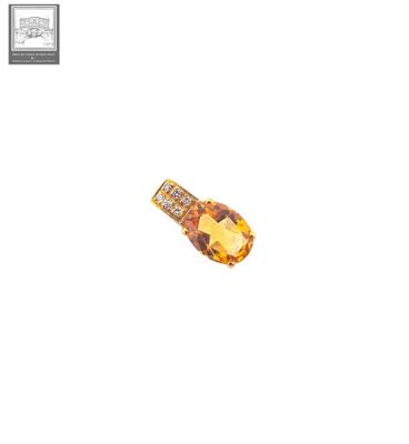 a close up of a piece of jewelry on a white surface