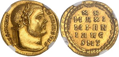 a gold coin with an image of a man on it
