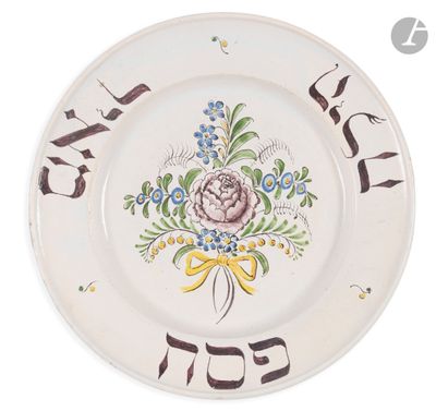 a white plate with a floral design on it