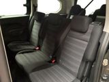 two seats in the back of a van that are empty