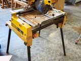 a table that has a saw on it in a room