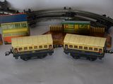 four toy trains that are sitting on a table