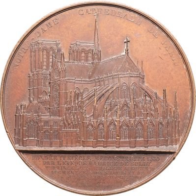une médaille de bronze sur laquelle est représentée une cathédrale