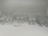 a lot of empty wine glasses on the table