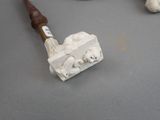 a hammer that is sitting on a table next to some rocks