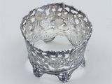 silver plated ring with flowers and leaves on the sides