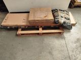 a pile of boxes sitting on top of a pallet