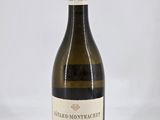 a bottle of wine that is sitting on a table