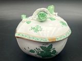 an image of a white and green bowl with a rose on it