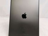 an apple ipad is sitting on top of a white table