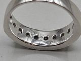 an image of a wedding ring with black diamonds