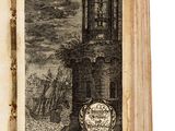 un vieux livre sur lequel figure l'image d'un phare
