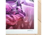 painting of a woman ' s face with flowing hair on a wooden floor