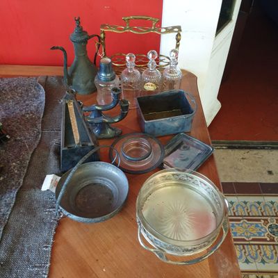 a wooden table with a lot of items on it