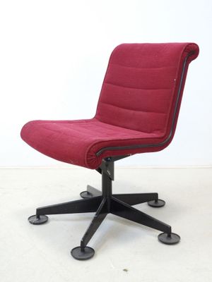 an image of a red office chair sitting on top of a black base