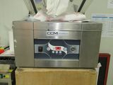 a machine that is sitting on a cart in a room