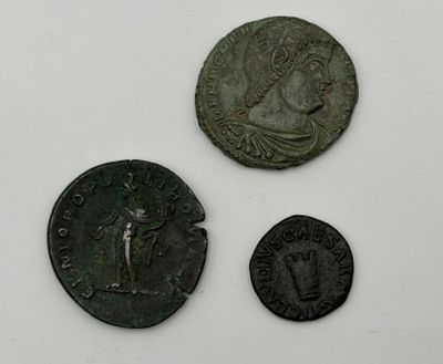 three ancient roman coins, one of which is a woman and one of which is a man