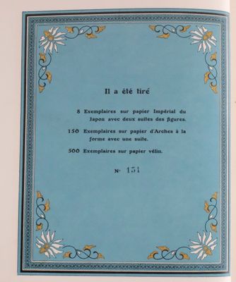 a blue book with a picture of flowers on it
