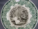 green and white plate with a picture of a woman in a bathtub