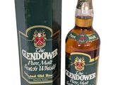 une bouteille de whisky écossais Glendower à côté d'une boîte