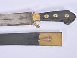 two knives that are laying side by side on a white surface