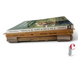 a stack of books sitting on top of each other