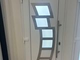 an image of a white door with a glass window