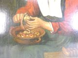 un tableau représentant une femme assise à une table devant un bol de nourriture