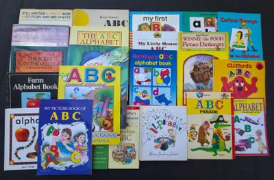 many children ' s books on the table together