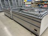 a refrigerated display case in a grocery store