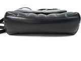 black leather purse on a white background with a black strap