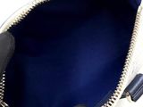 an image of a purse with a zipper on it