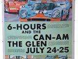 a poster of a race car and other race cars on display