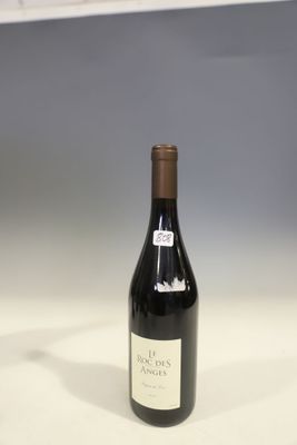 a bottle of wine that is sitting on a table