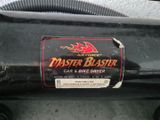 a sticker on the back of a car that says master blaster