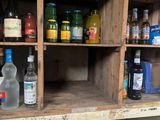 many bottles of alcohol on the shelves in the room