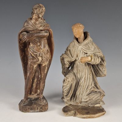 paire de figurines sculptées représentant un homme et une femme