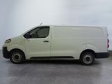 a picture of a white van parked in a parking lot