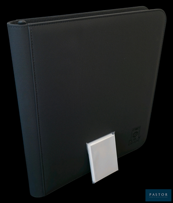 a black binder with a white button on it