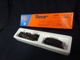 a box with a train on it next to a box with a train on it