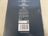 a black box with a barcode on it sitting on a table