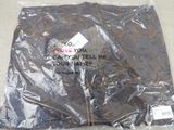 a plastic bag that has a t - shirt on it